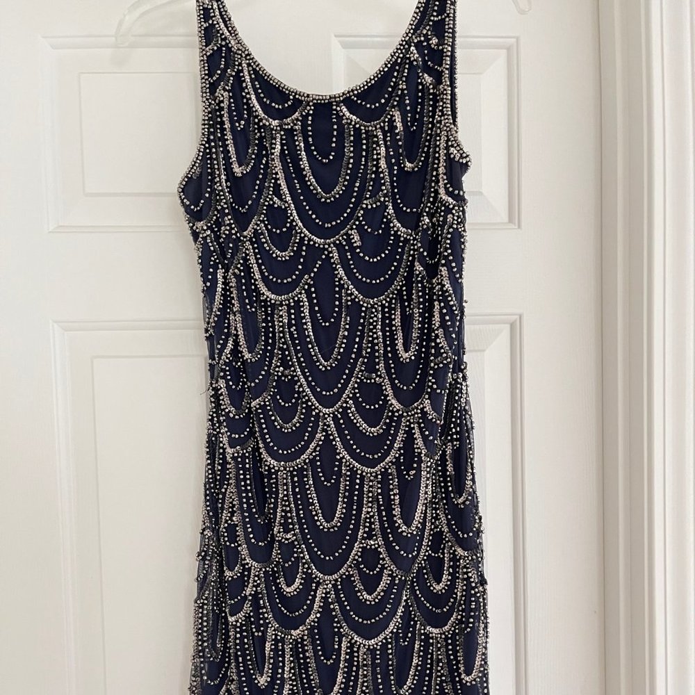 Sleeveless, beaded and sequined Pissaro Nights  navy cocktail dress.